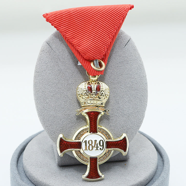 Austro-Hungarian Golden Cross of Merit with Crown 1849 FJ Red Ribbon detail view 2